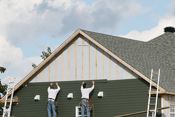 Professional Emergency Siding Repair technician working in Ottsville, PA